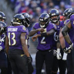 
              Baltimore Ravens players listen to Baltimore Ravens quarterback Tyler Huntley (2) in the second half of an NFL football game against the Denver Broncos, Sunday, Dec. 4, 2022, in Baltimore. (AP Photo/Patrick Semansky)
            
