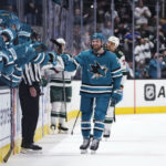 
              San Jose Sharks center Noah Gregor is congratulated for his goal against the Minnesota Wild during the first period of an NHL hockey game in San Jose, Calif., Thursday, Dec. 22, 2022. (AP Photo/Godofredo A. Vásquez)
            