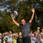 
              Scottie Scheffler celebrates after winning the 86th Masters golf tournament on Sunday, April 10, 2022, in Augusta, Ga. (AP Photo/Matt Slocum)
            