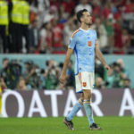 
              Spain's Sergio Busquets reacts after missing a penalty in a shootout during the World Cup round of 16 soccer match between Morocco and Spain, at the Education City Stadium in Al Rayyan, Qatar, Tuesday, Dec. 6, 2022. (AP Photo/Ebrahim Noroozi)
            