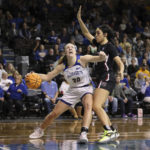 
              South Dakota State guard Tori Nelson (2) drives the hoop against South Carolina during NCAA college basketball game in Sioux Fall, S.D., on Thursday, Dec 15, 2022. (AP Photo/Josh Jurgens)
            