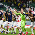 
              Players of Croatia's celebrate defeating Brazil in a penalty shootout during a World Cup quarterfinal soccer match at the Education City Stadium in Al Rayyan, Qatar, Friday, Dec. 9, 2022. (AP Photo/Manu Fernandez)
            
