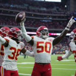
              Kansas City Chiefs cornerback L'Jarius Sneed (38), linebacker Willie Gay (50) and cornerback Trent McDuffie (21) celebrate the team's overtime win over the Houston Texans in an NFL football game Sunday, Dec. 18, 2022, in Houston. (AP Photo/Eric Christian Smith)
            