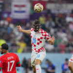 
              Croatia's Josko Gvardiol heads the ball during the World Cup third-place playoff soccer match between Croatia and Morocco at Khalifa International Stadium in Doha, Qatar, Saturday, Dec. 17, 2022. (AP Photo/Hassan Ammar)
            