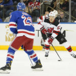 
              New Jersey Devils left wing Jesper Bratt (63) skates against New York Rangers defenseman Adam Fox (23) during the second period of an NHL hockey game, Monday, Dec. 12, 2022, at Madison Square Garden in New York. (AP Photo/Mary Altaffer)
            