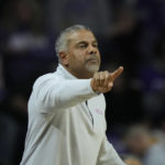 
              Kansas State head coach Jerome Tang motions to his players during the first half of an NCAA college basketball game against Wichita State Saturday, Dec. 3, 2022, in Manhattan, Kan. (AP Photo/Charlie Riedel)
            