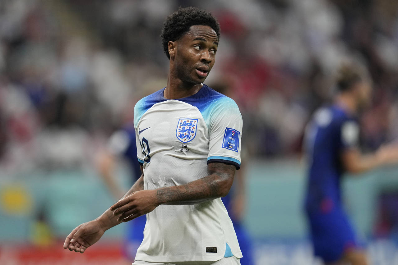 England's Raheem Sterling looks down the field during the World Cup group B soccer match between En...