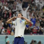
              England's Harry Kane reacts after he missed a penalty kick during the World Cup quarterfinal soccer match between England and France, at the Al Bayt Stadium in Al Khor, Qatar, Saturday, Dec. 10, 2022. (AP Photo/Frank Augstein)
            