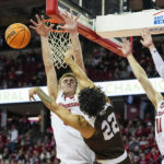 
              Wisconsin's Tyler Wahl, left, blocks out Lehigh's Tyler Whitney-Sidney (22) during the first half of an NCAA college basketball game Thursday, Dec. 15, 2022, in Madison, Wis. (AP Photo/Andy Manis)
            