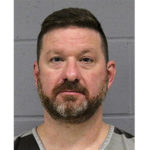 
              This photo provided by the Austin Police Department shows Chris Beard. Texas men’s basketball coach Chris Beard has been arrested on a felony family violence charge. Travis County jail records show that Beard was arrested by Austin police and was booked Monday, Dec. 12, 2022 on a charge of assault on a family or household member in which their breath was impeded. The charge is a third-degree felony with a possible punishment of two to 10 years in prison. (Austin Police Department via AP)
            
