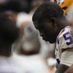 
              LSU offensive lineman Emery Jones (50) sits on the bench during the Southeastern Conference championship NCAA college football game against Georgia, Saturday, Dec. 3, 2022, in Atlanta. (AP Photo/Brynn Anderson)
            