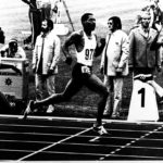 
              FILE - United States' Vince Matthews, right, raises his arms as he wins the final of the Olympic Games 400-meter dash, edging out teammate Wayne Collett, center. Julius Sang, left, of Kenya, finished third on Sept 7, 1972 in Munich. The International Olympic Committee says it will allow American gold-medal sprinter Matthews back at the games more than 50 years after banning him for his low-key racial injustice protest at the Munich Olympics. (AP Photo, File)
            