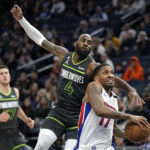 
              Detroit Pistons guard Rodney McGruder (17) works towards the basket while defended by Minnesota Timberwolves guard Jaylen Nowell (4) during the first half of an NBA basketball game, Saturday, Dec. 31, 2022, in Minneapolis. (AP Photo/Abbie Parr)
            