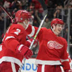 
              Detroit Red Wings defenseman Olli Maatta (2) is greeted by left wing Dominik Kubalik after scoring during the first period of an NHL hockey game against the Tampa Bay Lightning, Wednesday, Dec. 21, 2022, in Detroit. (AP Photo/Carlos Osorio)
            