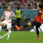 
              Croatia's Luka Modric, left, duels for the ball with Belgium's Axel Witsel during the World Cup group F soccer match between Croatia and Belgium at the Ahmad Bin Ali Stadium in Al Rayyan, Qatar, Thursday, Dec. 1, 2022. (AP Photo/Francisco Seco)
            