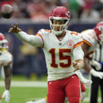 
              Kansas City Chiefs quarterback Patrick Mahomes (15) throws against the Houston Texans during the first half of an NFL football game Sunday, Dec. 18, 2022, in Houston. (AP Photo/David J. Phillip)
            