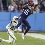 
              Tennessee Titans wide receiver Treylon Burks (16) unmakes a catch in front of Dallas Cowboys cornerback Nahshon Wright (25) during their game Friday, Dec. 30, 2022, in Nashville, Tenn. (AP Photo/Wade Payne)
            