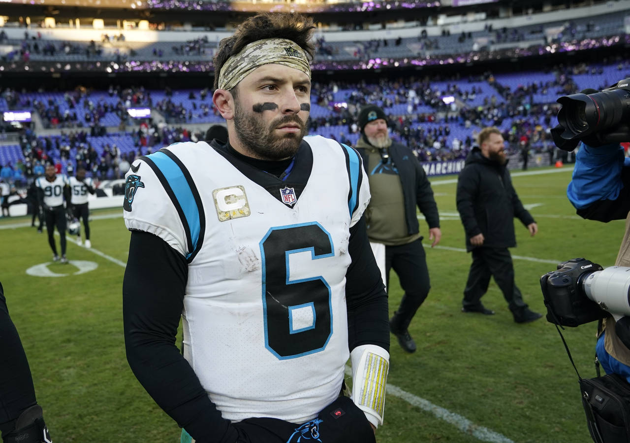FILE - Carolina Panthers quarterback Baker Mayfield (6) walks off the field after his teams loss to...