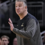 
              Purdue head coach Matt Painter yells to his team as they played against Davidson in the second half of an NCAA college basketball game in Indianapolis, Saturday, Dec. 17, 2022. (AP Photo/Michael Conroy)
            