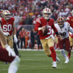 
              San Francisco 49ers quarterback Brock Purdy (13) rushes the ball in the second half of an NFL football game against the Washington Commanders, Saturday, Dec. 24, 2022, in Santa Clara, Calif. (AP Photo/Jed Jacobsohn)
            