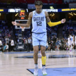 
              Memphis Grizzlies guard Ja Morant dances on the court in the second half of the team's NBA basketball game against the Oklahoma City Thunder on Wednesday, Dec. 7, 2022, in Memphis, Tenn. (AP Photo/Brandon Dill)
            