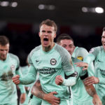 
              Brighton's Solly March, centre, celebrates with his team mates after scoring his sides third goal of the game during the Premier League soccer match between Southampton and Brighton, at St. Mary's Stadium in Southampton, England, Monday Dec. 26, 2022. (Adam Davy/PA via AP)
            