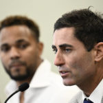 
              San Diego Padres general manager A.J. Preller, right, speaks as Padres' Xander Bogaerts, left, looks on at a news conference held to announce that Bogaerts' $280 million, 11-year contact with the team has been finalized, Friday, Dec. 9, 2022, in San Diego. (AP Photo/Denis Poroy)
            