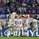 
              Croatia players celebrate their victory in the World Cup round of 16 soccer match between Japan and Croatia at the Al Janoub Stadium in Al Wakrah, Qatar, Monday, Dec. 5, 2022. (AP Photo/Eugene Hoshiko)
            