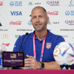 
              Head coach Gregg Berhalter of the United States attends a press conference on the eve of the round of 16 World Cup soccer match between the Netherlands and the United States at Kalifa International Stadium, in Doha, Qatar, Friday, Dec. 2, 2022. (AP Photo/Ashley Landis)
            