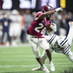 
              Jackson State safety Shilo Sanders tackles North Carolina Central wide receiver Twan Flip Jr. during the second half of the Celebration Bowl NCAA college football game Saturday, Dec. 17, 2022, in Atlanta. (AP Photo/Hakim Wright Sr. )
            