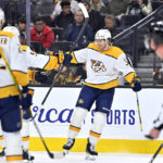 
              Nashville Predators defenseman Jeremy Lauzon (3) reacts after scoring against the Vegas Golden Knights during the first period of an NHL hockey game Saturday, Dec. 31, 2022, in Las Vegas. (AP Photo/David Becker)
            