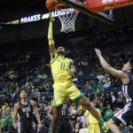 
              Oregon guard Rivaldo Soares (11) shoots against Washington State during the first half of an NCAA college basketball game in Eugene, Ore., Thursday, Dec. 1, 2022. (AP Photo/Thomas Boyd)
            