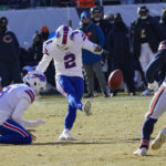 
              Buffalo Bills kicker Tyler Bass (2) kicks a field goal that missed right from the hold of Sam Martin in the first half of an NFL football game against the Chicago Bears in Chicago, Saturday, Dec. 24, 2022. (AP Photo/Charles Rex Arbogast)
            