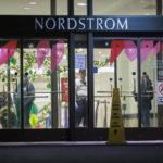 
              Customers and security guards are seen during a lockdown in Nordstrom at Mall of America after a shooting on Friday, Dec. 23, 2022. (Kerem Yücel/Minnesota Public Radio via AP)
            