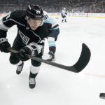 
              Los Angeles Kings center Jaret Anderson-Dolan, left, chases the puck while under pressure from Seattle Kraken right wing Daniel Sprong during the third period of an NHL hockey game Tuesday, Nov. 29, 2022, in Los Angeles. (AP Photo/Mark J. Terrill)
            