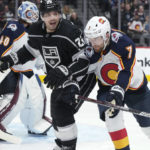 
              Colorado Avalanche defenseman Devon Toews, right, fights for position against Los Angeles Kings left wing Kevin Fiala in the second period of an NHL hockey game Thursday, Dec. 29, 2022, in Denver. (AP Photo/David Zalubowski)
            