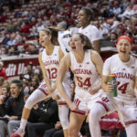
              Indiana players on the bench react as the team scores against Morehead State during the second half of an NCAA college basketball game, Sunday, Dec. 18, 2022, in Bloomington, Ind. (AP Photo/Doug McSchooler)
            
