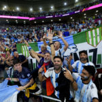 
              Argentina's fans celebrate winning the World Cup round of 16 soccer match between Argentina and Australia at the Ahmad Bin Ali Stadium in Doha, Qatar, Saturday, Dec. 3, 2022. (AP Photo/Petr David Josek)
            