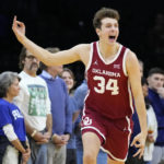 
              Oklahoma's Jacob Groves reacts after a basket during the first half of an NCAA college basketball game against Villanova, Saturday, Dec. 3, 2022, in Philadelphia. (AP Photo/Matt Slocum)
            