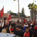 
              Moroccans celebrate their World Cup victory against Portugal in the Morocco-administered Western Sahara city of Laayoune, Saturday, Dec. 10, 2022. (AP Photo/Noureddine Abakchou)
            