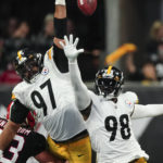 
              Pittsburgh Steelers defensive tackle Cameron Heyward (97) and defensive end DeMarvin Leal (98) attempt a block on a field goal by the Atlanta Falcons during the first half of an NFL football game, Sunday, Dec. 4, 2022, in Atlanta. (AP Photo/John Bazemore)
            