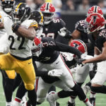 
              Pittsburgh Steelers running back Najee Harris (22) runs against the Atlanta Falcons during the second half of an NFL football game, Sunday, Dec. 4, 2022, in Atlanta. (AP Photo/Brynn Anderson)
            