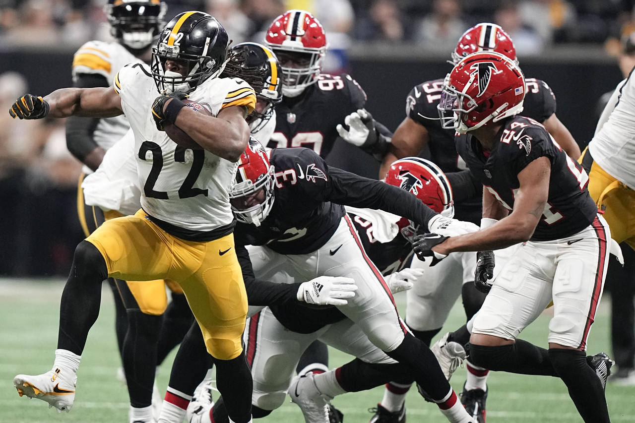 Pittsburgh Steelers running back Najee Harris (22) runs against the Atlanta Falcons during the seco...