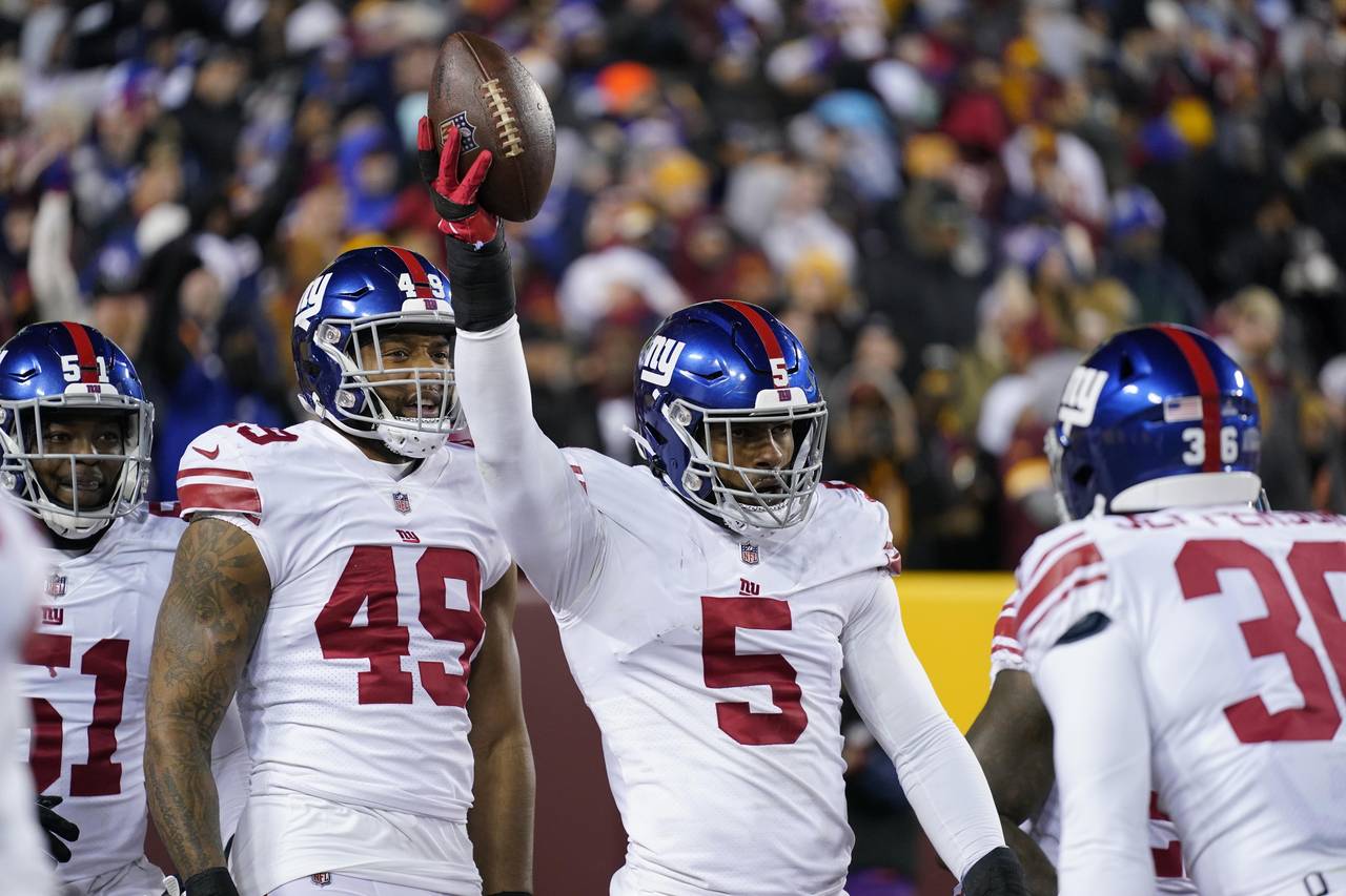 New York Giants defensive end Kayvon Thibodeaux (5) celebrates after scoring a touchdown during the...