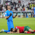 
              Morocco's goalkeeper Yassine Bounou, left, celebrates with his teammate Morocco's Achraf Hakimi their team victory over Portugal during the World Cup quarterfinal soccer match between Morocco and Portugal, at Al Thumama Stadium in Doha, Qatar, Saturday, Dec. 10, 2022. (AP Photo/Ariel Schalit)
            