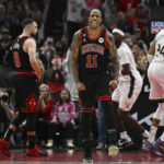 
              Chicago Bulls' DeMar DeRozan (11) reacts after scoring against the Milwaukee Bucks during overtime in an NBA basketball game Wednesday, Dec. 28, 2022, in Chicago. (AP Photo/Quinn Harris)
            