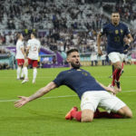 
              France's Olivier Giroud celebrates after scoring the opening goal during the World Cup round of 16 soccer match between France and Poland, at the Al Thumama Stadium in Doha, Qatar, Sunday, Dec. 4, 2022. (AP Photo/Ebrahim Noroozi)
            