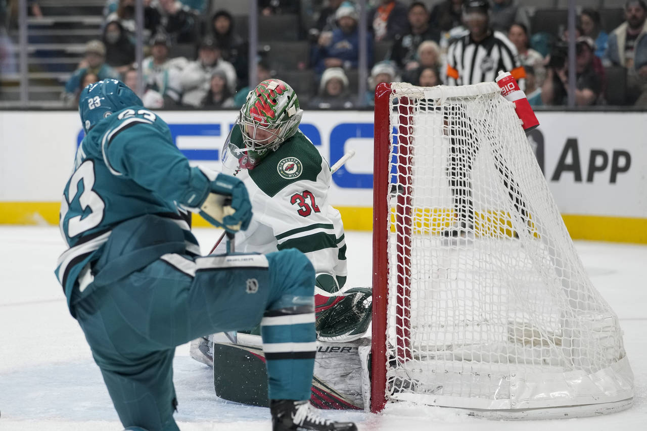 Minnesota Wild goaltender Filip Gustavsson (32) is unable to stop a shot by San Jose Sharks left wi...