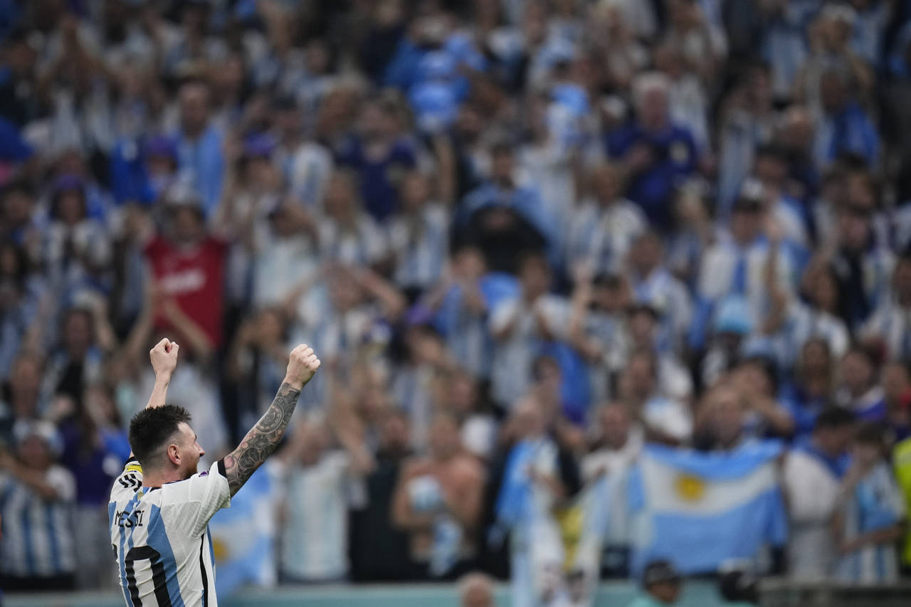 Argentina's Lionel Messi celebrates after the World Cup semifinal soccer match between Argentina an...