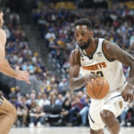 
              Denver Nuggets forward Jeff Green, right, drives to the rim as Memphis Grizzlies forward Santi Aldama defends in the first half of an NBA basketball game Tuesday, Dec. 20, 2022, in Denver. (AP Photo/David Zalubowski)
            